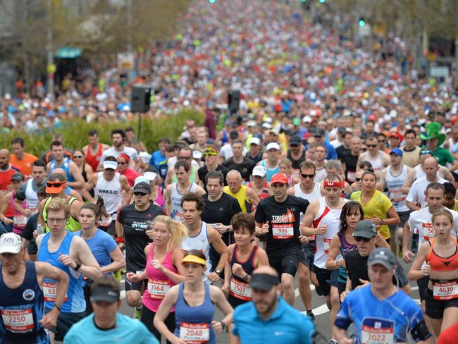 Thousands of runners take part in the annual City2Surf road race in Sydney on August 10, 2014.