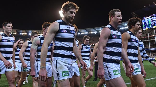 Tom Longeran, front left, and Steven Johnson, third from right, make their way from the MCG in 2015. Picture: AAP Image/Julian Smith