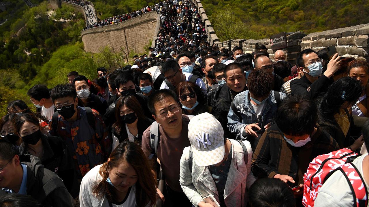 Crowds packed into popular tourists spots around China, including the Great Wall. Picture: Noel Celis/AFP