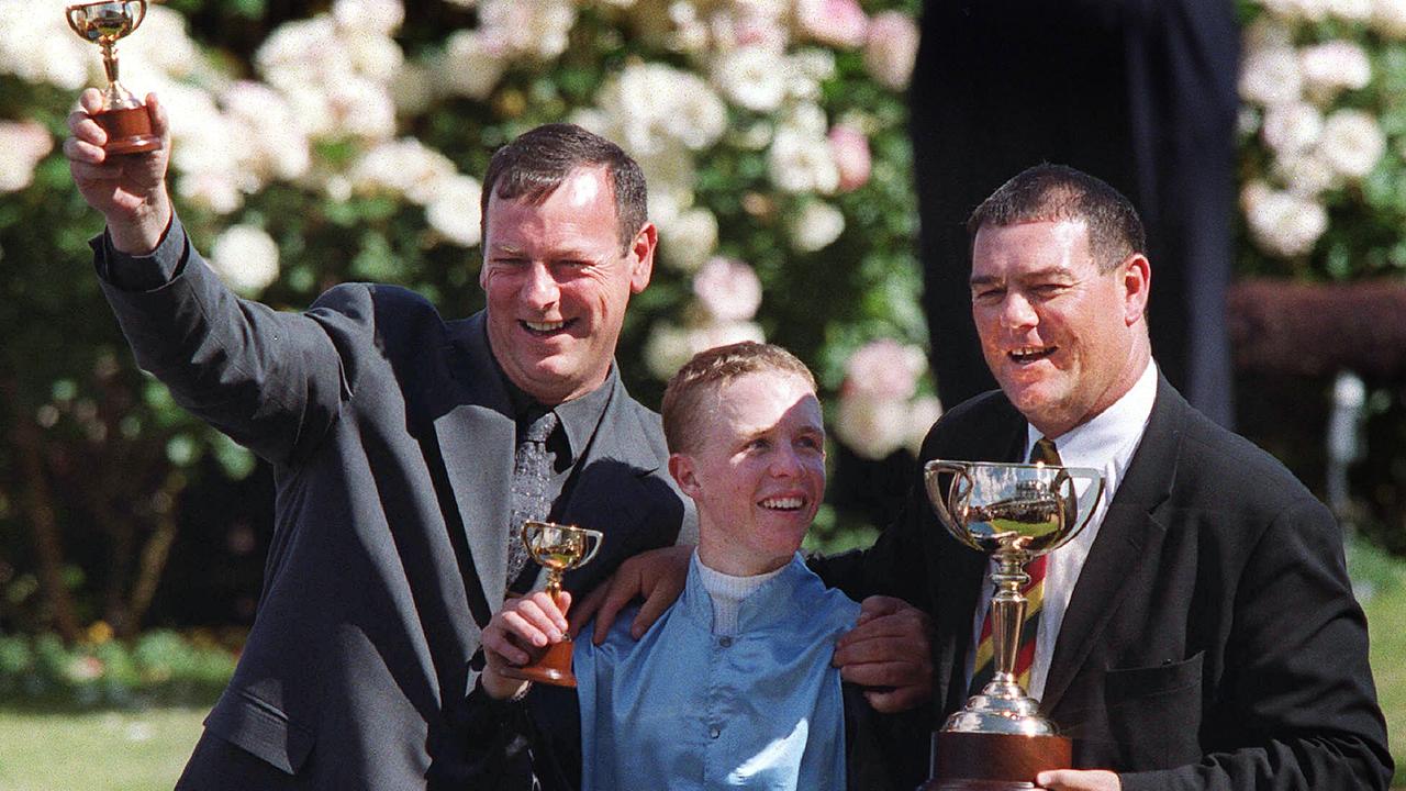 Moroney with jockey Kerrin McEvoy and part-owner Paul Moroney after Brew’s Melbourne Cup win in 2000. Picture: Colleen Petch