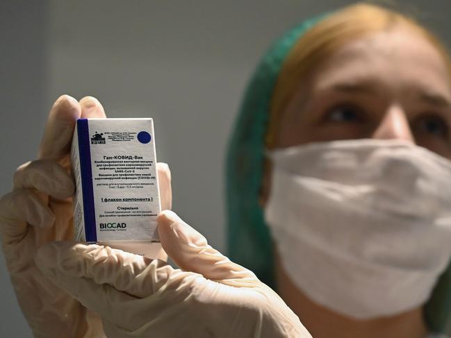 A medical worker holds a box with a vial of Russia's Sputnik V (Gam-COVID-Vac) vaccine against coronavirus. Picture: AFP