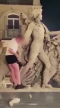 Tourist arrested after shock act on statue