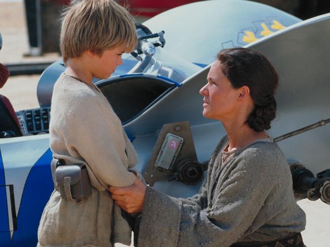 Actor Jake Lloyd (L) and Pernilla August in 1999 film Episode I - The Phantom Menace.