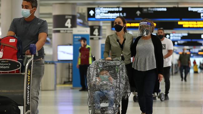 Travellers at Miami International Airport in Florida. Picture: Getty Images/AFP