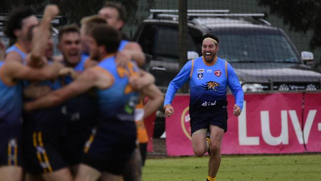 Dale Thomas and the Nhill Tigers celebrate a drought-breaking win. Picture: Gayle Newcombe