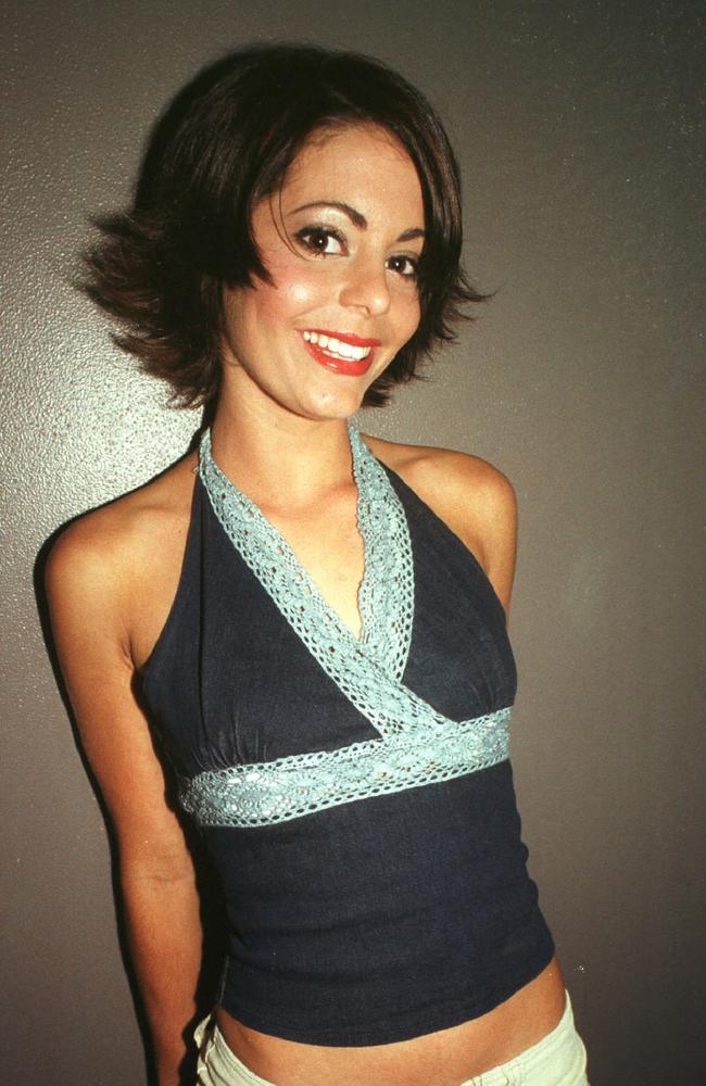 Roxy Karas enjoys her night out at the Rolling Rock nightclub in December 2002. Picture: Sharyn Rosewarne