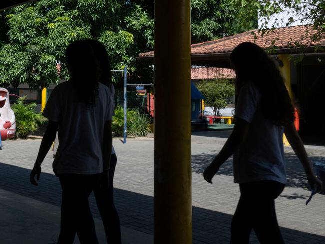 Municipal Burle Marx School's students walk to their classrooms after eating lunch in the school canteen in Rio de Janeiro, Brazil, on April 4, 2024.Â . Nearly one-third of children in Brazil are obese, an epidemic city health officials and community leaders are seeking to address in innovative ways, enlisting school cafeterias and taking their message of healthful eating to the street. (Photo by Pablo PORCIUNCULA / AFP)