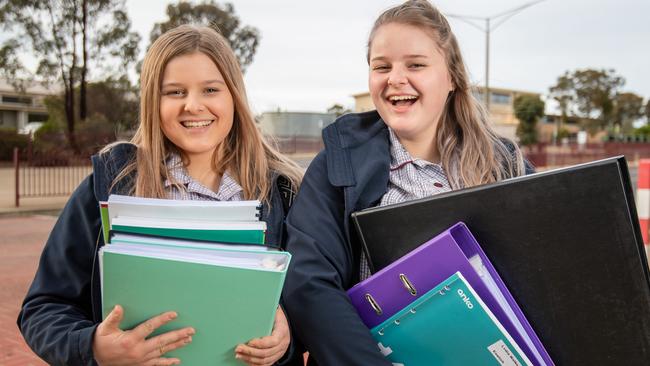 Year 11 twins Demi and Lydia Walkeri will be heading back to school in May. Picture: Jason Edwards