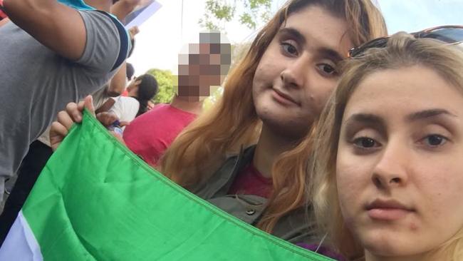 Naz Almasi with her sister Golly at an anti-Iranian regime protest in Melbourne in 2016. Picture: Emma Murray/The Australian