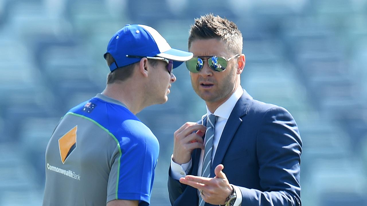 Michael Clarke (right) says Steve Smith is being burned by Australia.  Photo: AAP