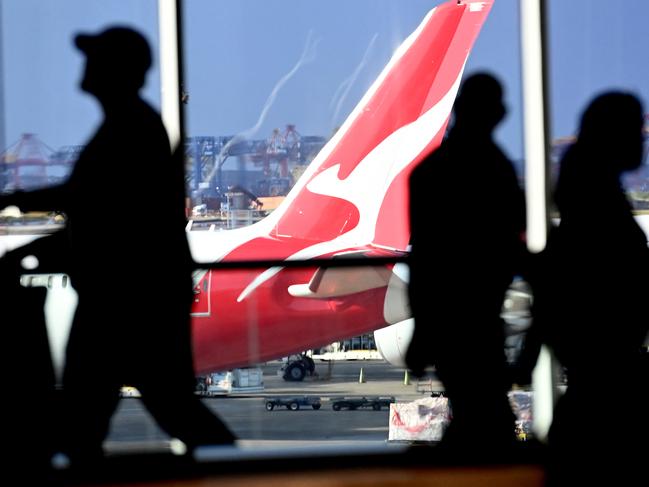 SYDNEY, AUSTRALIA - NewsWire Photos JULY 29, 2022: General scenes of a Qantas plane at the arrival gate at SydneyÃs International AirportPicture: NCA NewsWire / Jeremy Piper