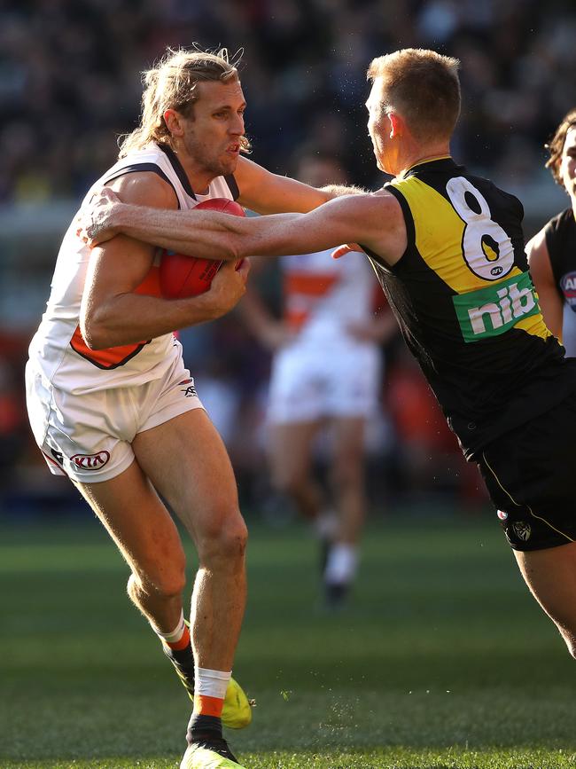 GWS defender Nick Haynes tries to evade a Jack Riewoldt tackle in last year’s Grand Final. Picture: Phil Hillyard.