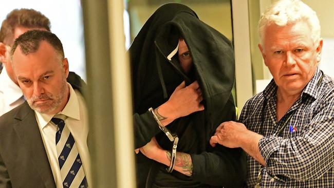 Aaron Donald Carver is extradited from Queensland to face murder charges. Picture: Tom Huntley