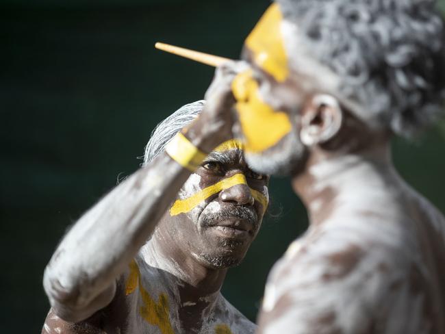 Members of the Gumatj clan prepare for bunggul (traditional dance) at the Garma Festival in northeast Arnhem Land. Picture: PETER EVE