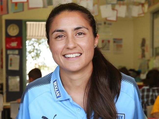 Pictured is Sydney FC W-League captain Teresa Polias with tyear1 students Olivia Lygdas and Ruby Van Bueren who she teaches at a primary school in Roselands.Picture: Richard Dobson