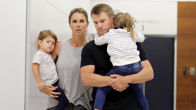 David Warner with his wife and two kids at Sydney Internation Airport. Picture: Christian Gilles