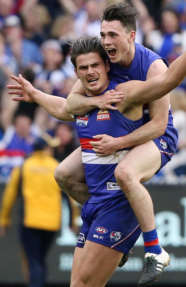 Tom Boyd and Toby McLean celebrate during the 2016 Grand Final. Photo: Wayne Ludbey