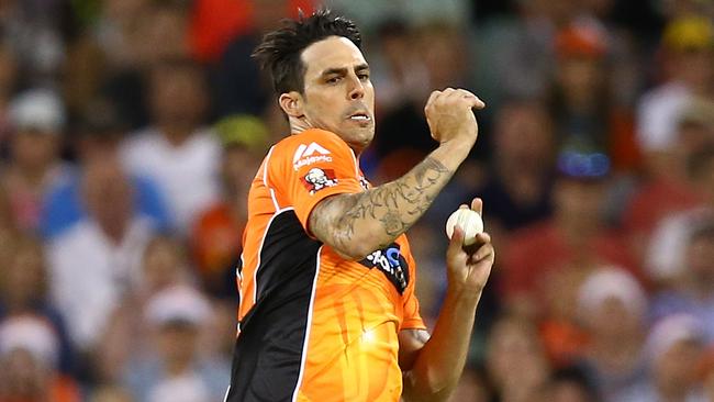 Mitchell Johnson took three wickets on his return to professional cricket.