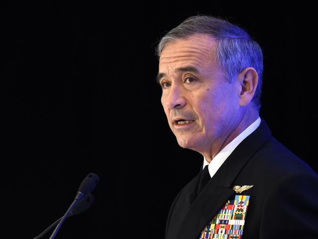 (FILES) In this file photo taken on October 17, 2017 Admiral Harry B Harris, Jr, Commander, United States Pacific Command delivers his speech on "Challenges, Opportunities, and Innovation in the Indo-Asia-Pacific" at the 30th International Institute for Strategic Studies (IISS) Fullerton Lecture in Singapore. China's military might is growing at such a pace that it could soon rival American power "across almost every domain," a top US military official said February 14, 2018. Admiral Harry Harris, who heads up the military's enormous Pacific Command (PACOM), warned lawmakers they must be wary of Beijing's investments in traditional assets as well as its development of a new wave of technologies such as hypersonic missiles and artificial intelligence.  / AFP PHOTO / Roslan RAHMAN