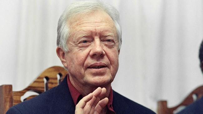 Former US president Jimmy Carter speaks during his trip in Zambia in 1991.