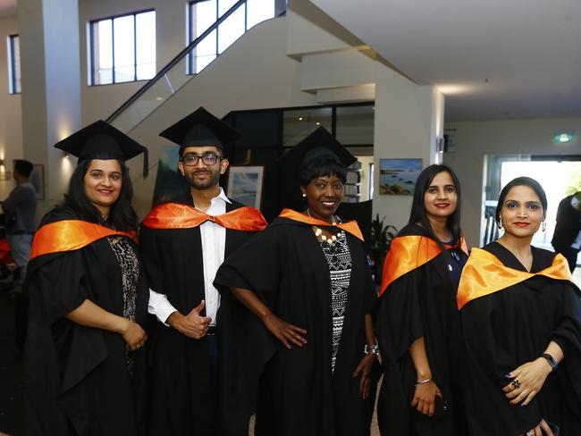 UTAS Graduations - Tasmanian School of Business and Economics and Graduate Research graduates are pictured before the ceremony. (L-R) Rutu Makadia, Devan Punj, Margaret Muchaki, Gurmeet Kaus, Sharajit, Kaus. Picture: MATT THOMPSON