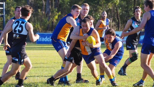 29/03/2023 - ATW Eagles coach Shaun Stone has hailed Michael Blair (centre) as one of the best players in the Wide Bay AFL senior competition. Picture: Samantha Hayhoe