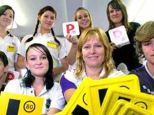 Driving ambition: Julie Nixon, of All Wheel Driver Education (front, second from right), is working with DAISI to help (front from left) Morgan Baker, Katryna Hall, Trent Vlaming, (rear from left) Renee Churchill, Keyarrah Delauney, Tiarna Brooker, and Lauren Shepheard pass their driving tests. Picture: Jay Cronan