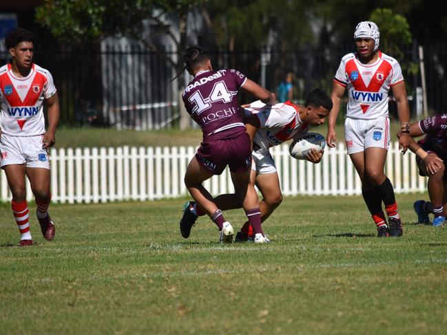 Logan Huia tackles Ibrahim Charara. Picture: Sean Teuma/NewsLocal