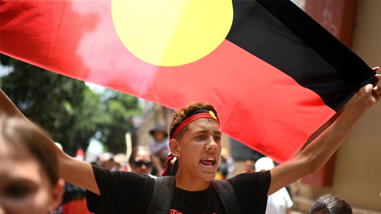 Protesters take part in an Invasion Day rally and march in Brisbane, coinciding with Australia Day. Picture: NCA Newswire / Dan Peled