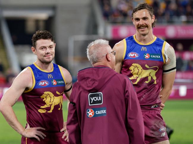 Lachie Neale, Chris Fagan and Joe Daniher. (Photo by Russell Freeman/AFL Photos via Getty Images)