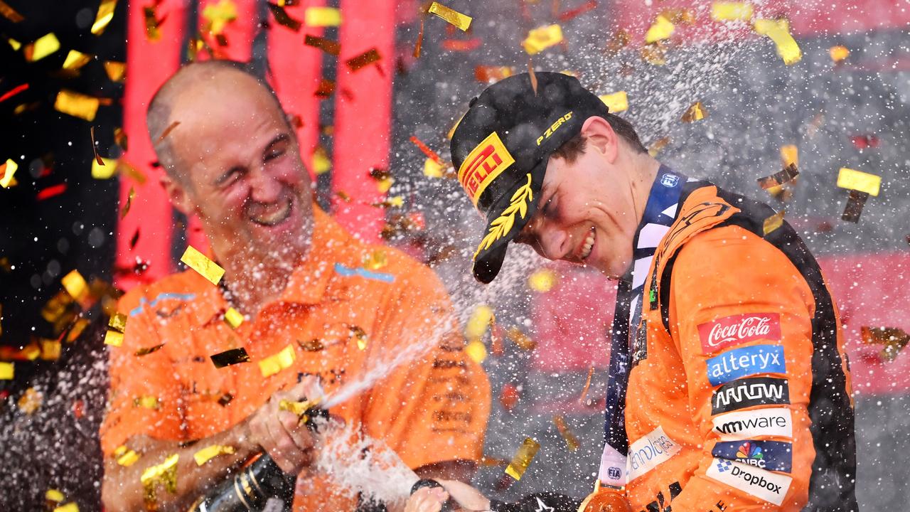 Race winner Oscar Piastri of Australia and McLaren race engineer Tom Stallard celebrate on the podium during the F1 Grand Prix of Azerbaijan. Picture: Dan Mullan/Getty Images