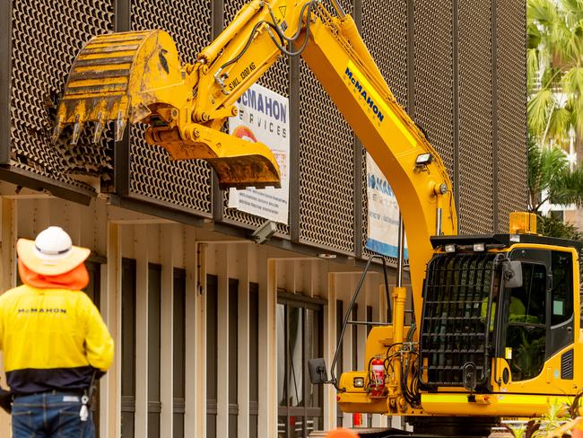 The wrecking crews have moved in and the walls of the old Chan Building opposite Parliament House have started coming down. Picture: Che Chorley