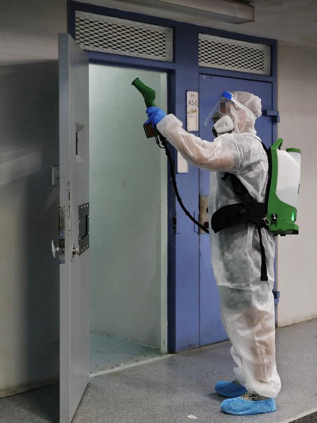 An inmate on the COVID cleaning team pictured deep cleaning a cell after an inmate is moved. Picture: Sam Ruttyn