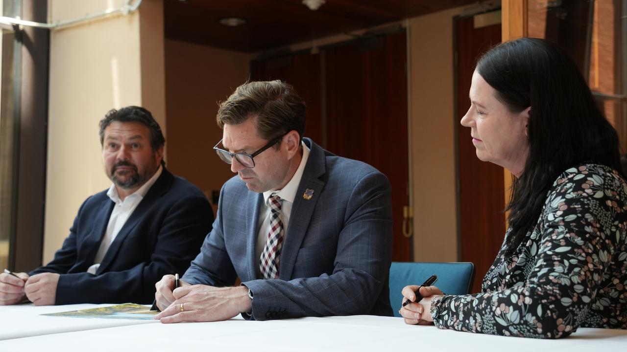 At the contract signing between the Toowoomba Regional Council, Seymour Whyte and SMEC Australia for the Cressbrook Dam safety upgrade project are (from left) Seymour Whyte COO Steve Lambert, mayor Geoff McDonald and SMEC acting chief executive Kate Drews. December 2023.