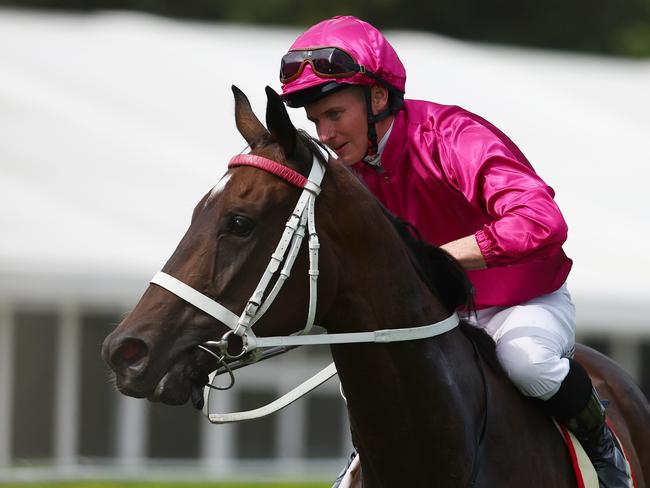 SYDNEY, AUSTRALIA - FEBRUARY 17: James Mcdonald riding Fangirl wins Race 7 Petaluma Apollo Stakes during "Apollo Stakes Day" - Sydney Racing at Royal Randwick Racecourse on February 17, 2024 in Sydney, Australia. (Photo by Jeremy Ng/Getty Images)