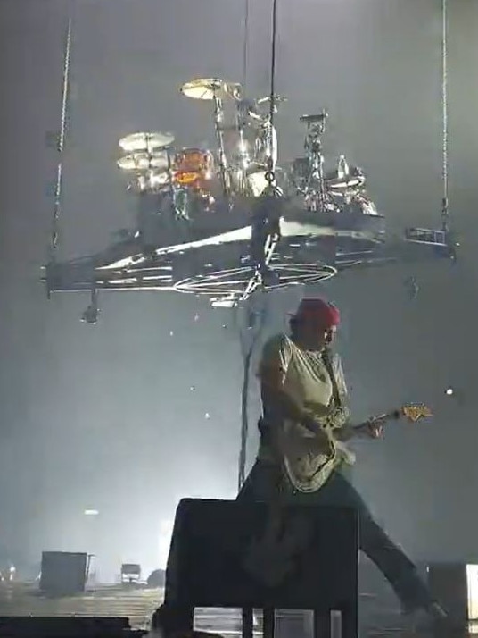 At one stage during the band’s show, Travis Barker’s drum kit is lifted above the stage.