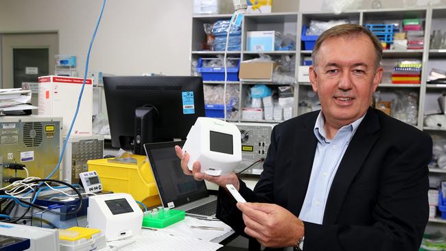 AnteoTech CEO Derek Thomson pictured in one of the labs and with the newly approved Covid testing machine about to be sold to Europe, Eight Mile Plains Monday 12th April 2021 Picture David Clark