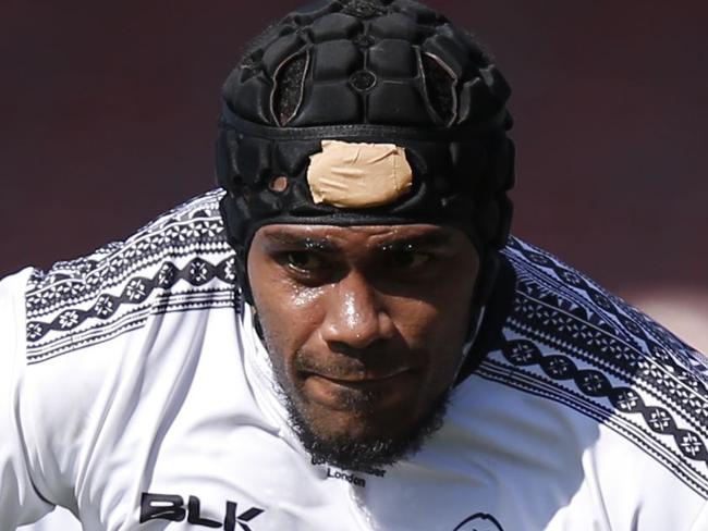 Fiji's flanker Dom Waqaniburotu is tackled by Canada's scrum half Gordon McRorie (R) during the international rugby union friendly match between Canada and Fiji, ahead of the 2015 Rugby World Cup, at The Stoop in Twickenham, west of London, on September 6, 2015. AFP PHOTO / ADRIAN DENNIS