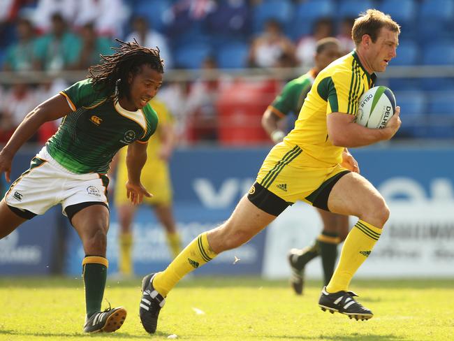 James Stannard scores a try at the Delhi Commonwealth Games in 2010.