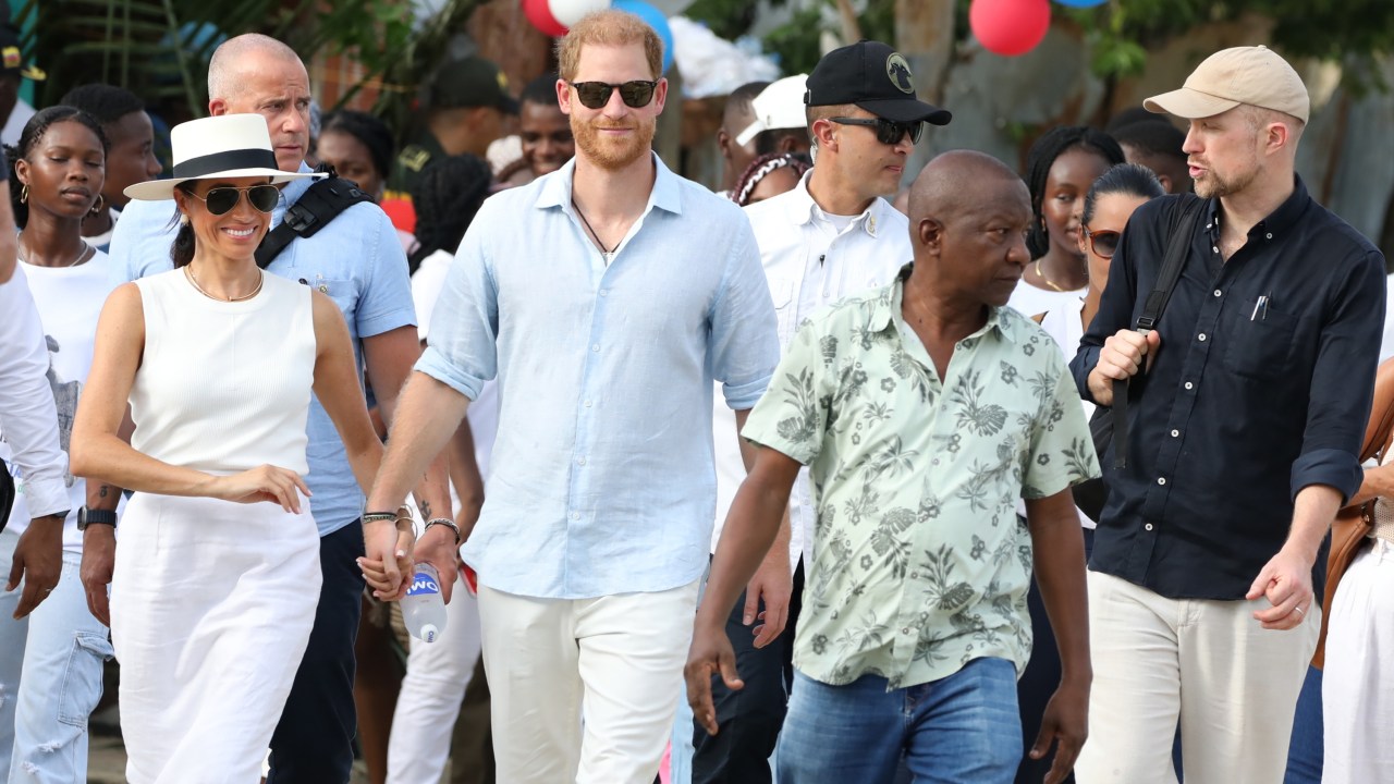 The Sussexes visited the historical town of San Basilio de Palenque on Saturday flanked by security. Picture by Vizzor Image/Getty Images.