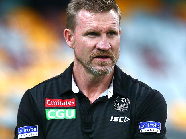 BRISBANE, AUSTRALIA - AUGUST 15: Magpies coach Nathan Buckley looks on before the round 12 AFL match between the Melbourne Demons and the Collingwood Magpies at The Gabba on August 15, 2020 in Brisbane, Australia. (Photo by Jono Searle/AFL Photos/via Getty Images)