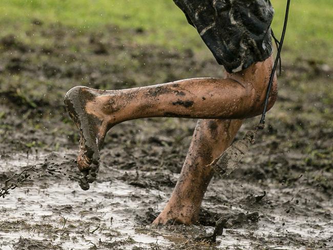 LISMORE, AUSTRALIA - NewsWire Photos - MARCH 10, 2025: Muddy conditions in the aftermath of TC Alfred have heightened the dangers of soil borne disease present in the mud.Picture: NewsWire / Glenn Campbell