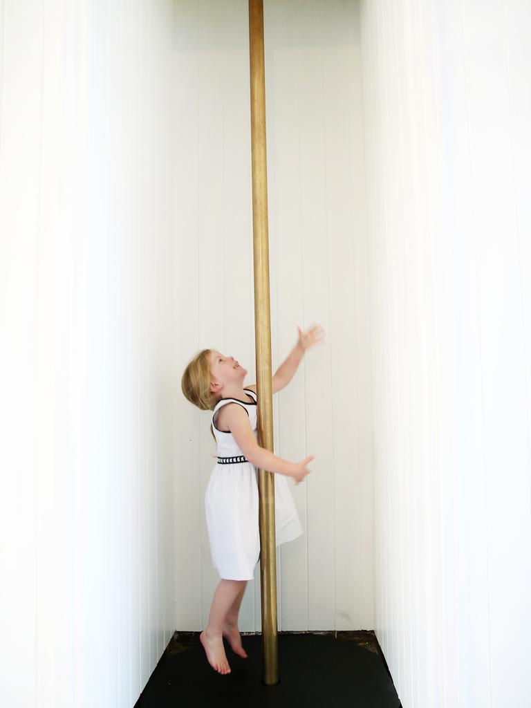 Children love the old fire pole which remains in the home. Picture: Elise Searson