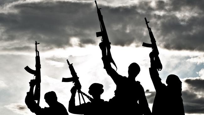 Silhouette of militants with rifles.