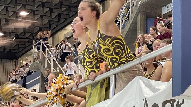 Some of the St Rita's cheer squad roaring their swim mates on.