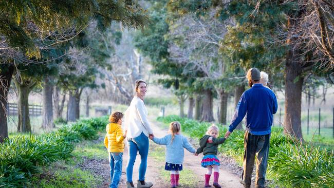 Virginia Tapscott from Bowna near Albury feels she is undervalued for the work she puts in. Pictured with her family Tully 8mths, Oscar, 6, Elke, 4, Eva, 2, and husband Rhys. Photo: Simon Dallinger