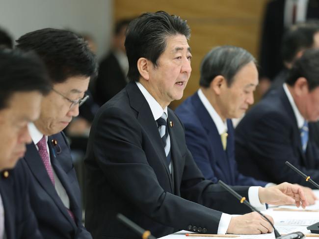 Japan's Prime Minister Shinzo Abe attend a meeting at the new COVID-19 coronavirus infectious disease control headquarters at the prime minister's office in Tokyo. Picture: AFP