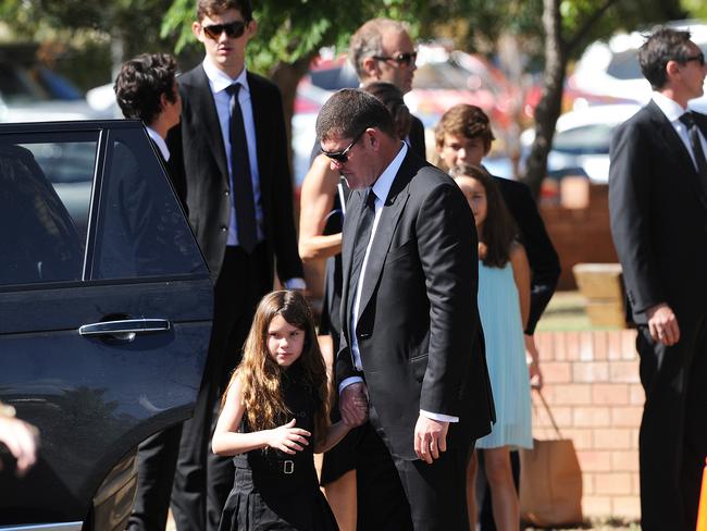 James Packer comforts ex-wife Erica as she farewells her father, ‘72 ...