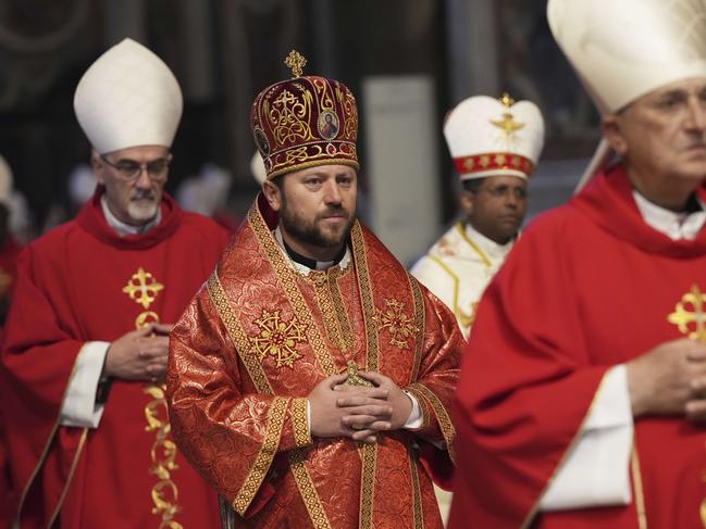 Cardinal Mykola Bychok, second from left, arrives in procession for a mass during the days of mourning for late Pope Francis, in St. Peter's Basilica, at the Vatican. Picture: AP Photo