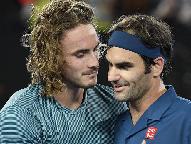 That moment when you beat the guy you grew up idolising. Stefanos Tsitsipas with Roger Federer. AP Photo/Andy Brownbill